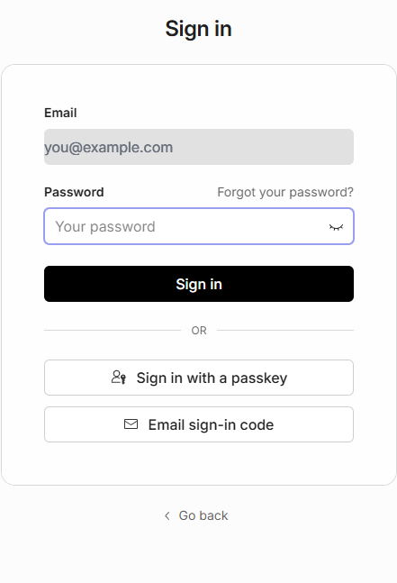 Hosted sign-in password step showing the email confirmed above, a Password field with Forgot your password link, a Sign in button, and passwordless alternatives for passkey and email sign-in code